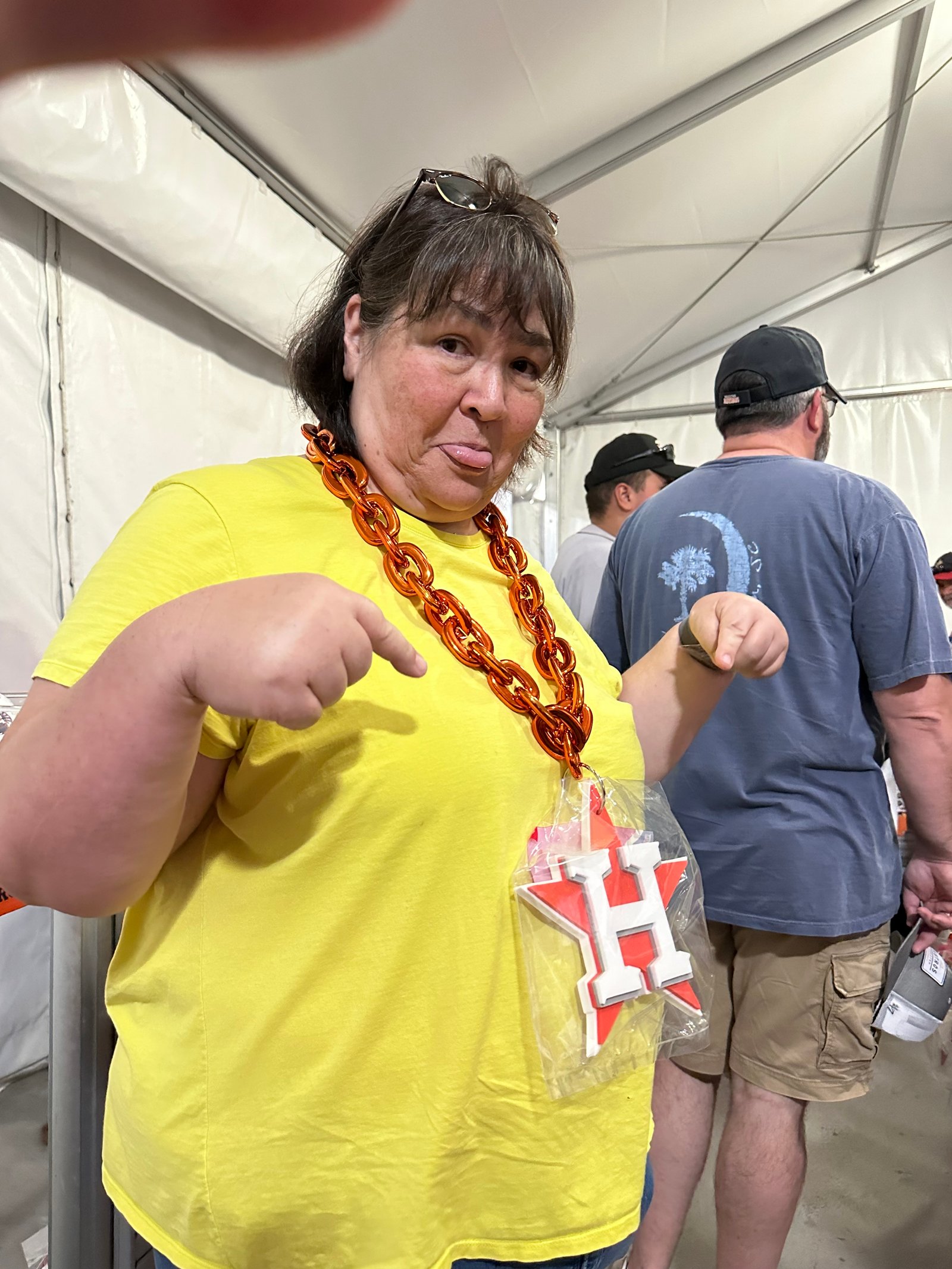 Wearing an Astros necklace