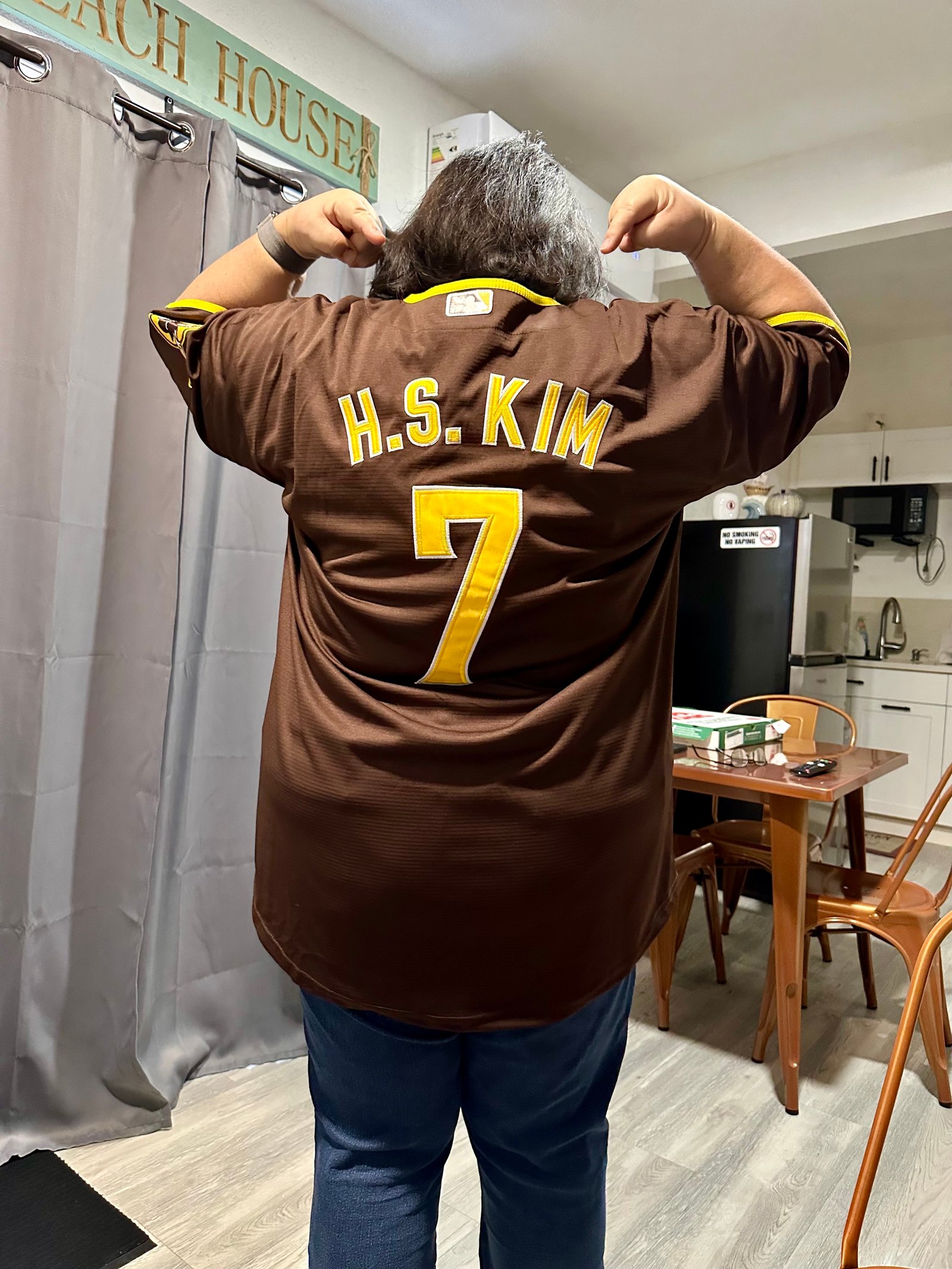 Showing off an H. S. Kim jersey